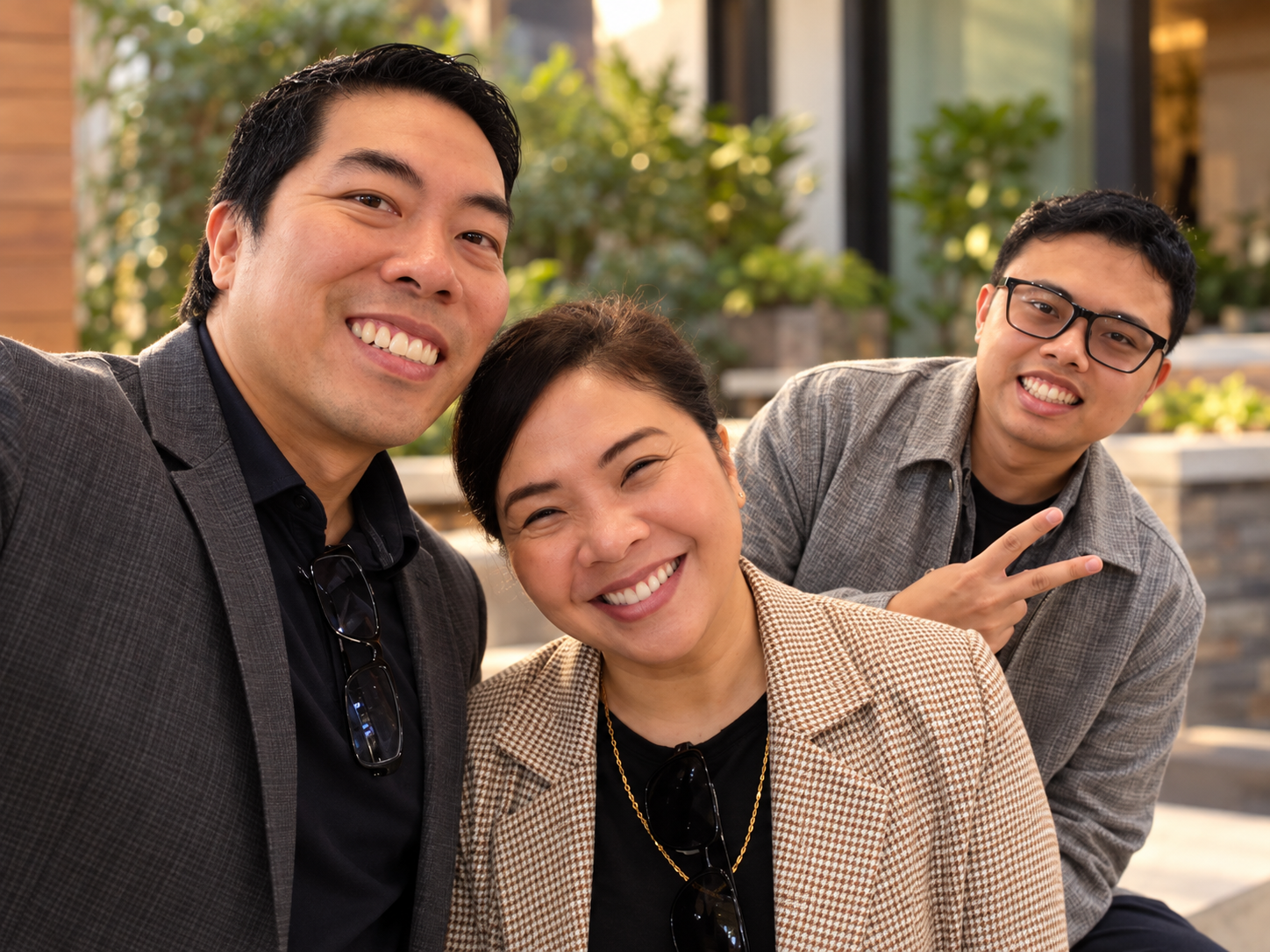 The founders of Velocity Home Buyers smiling together outdoors